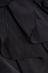 Ruffled Mid-Rise Flared Trousers in Black