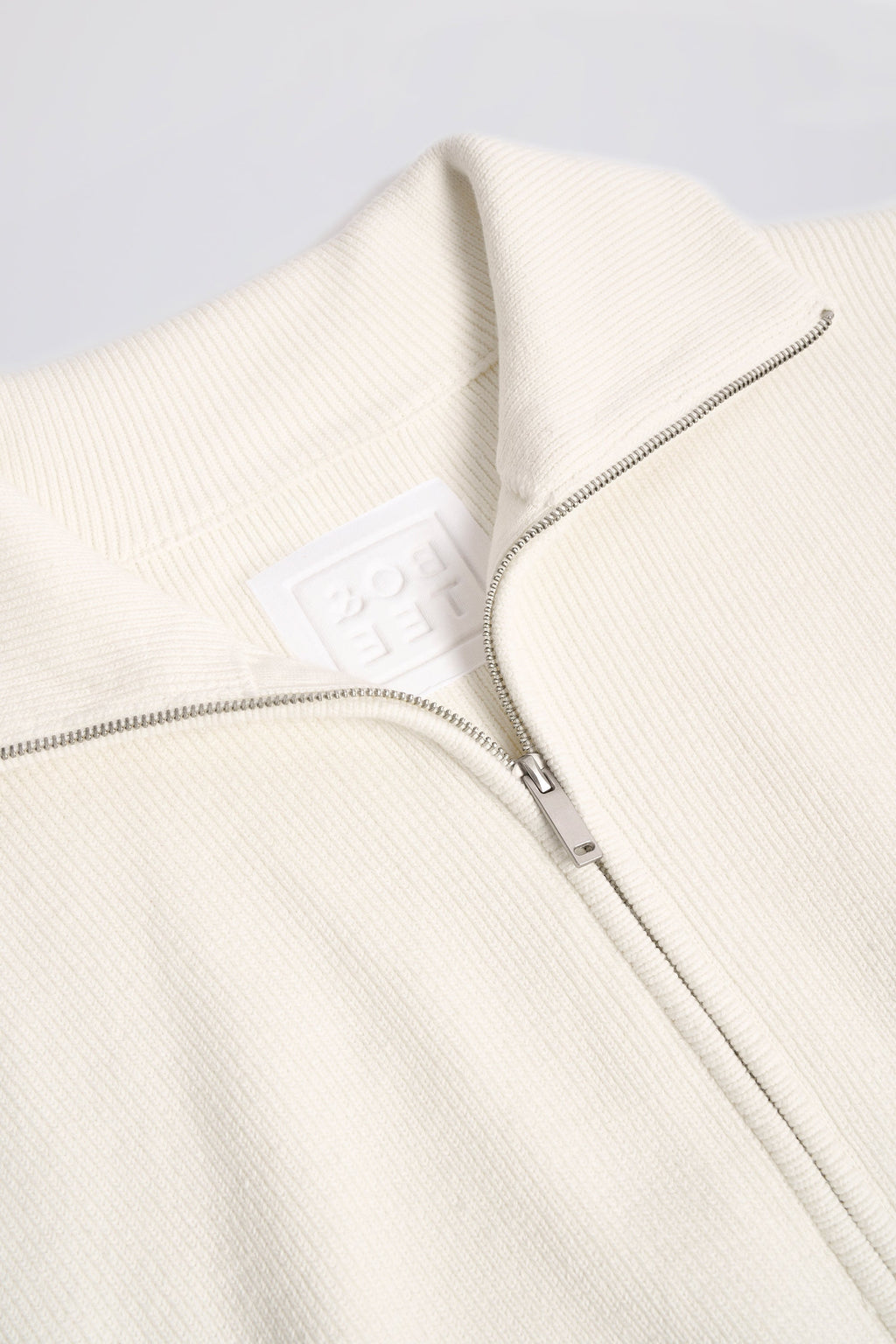 Ribbed Knit Zip-Up Cropped Sweatshirt in Ivory